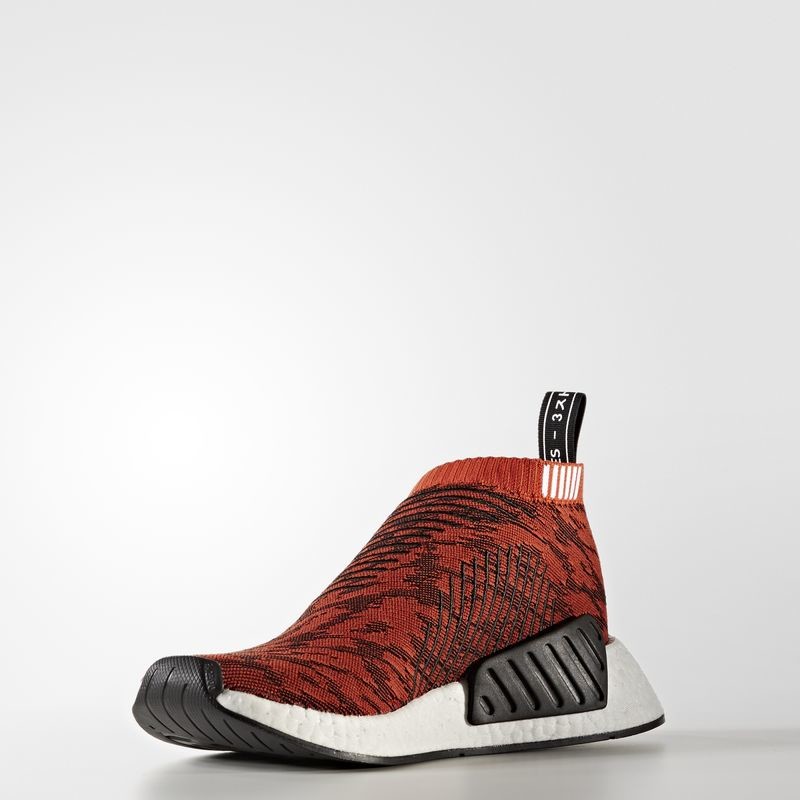 Adidas nmd cs2 primeknit red glitch best sale